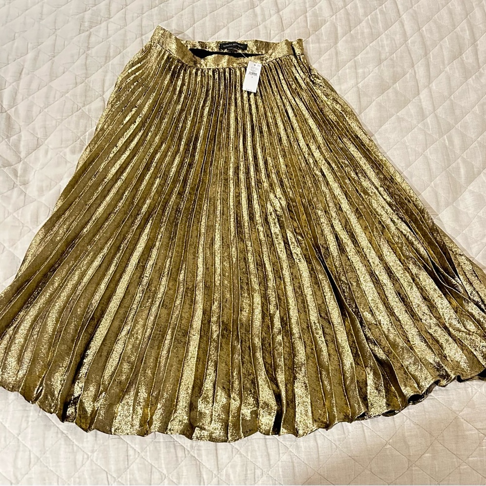 Banana Republic. Gold color.  long skirt. size 0